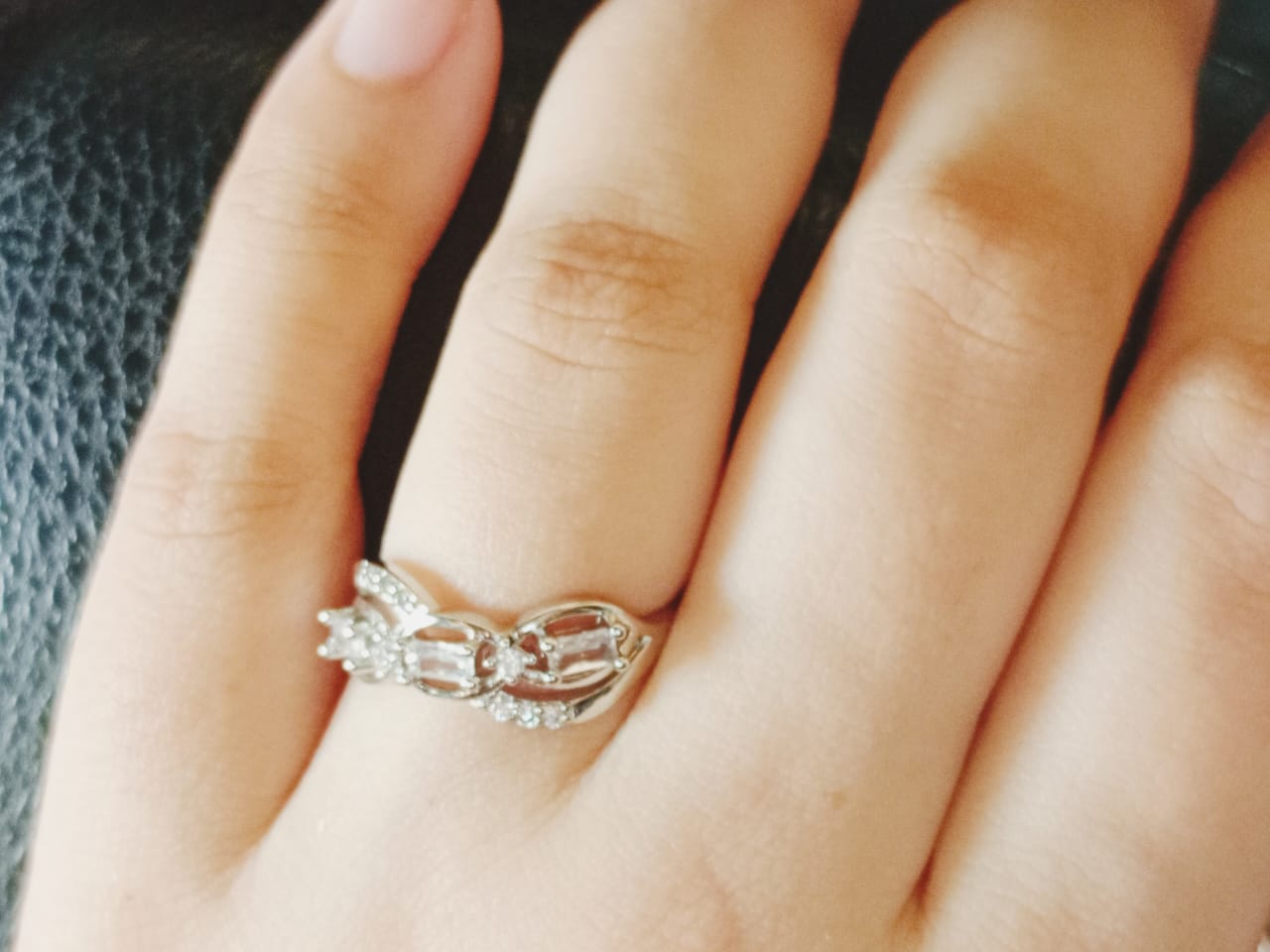 Silver Plated Twist Elegance Zircon Ring Jewelry (Adjustable)