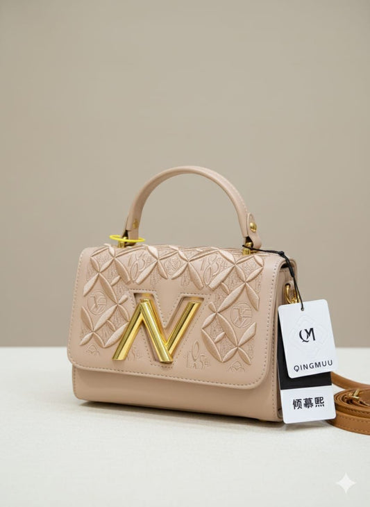 Luxe Noir Emblem Top-Handle Bags